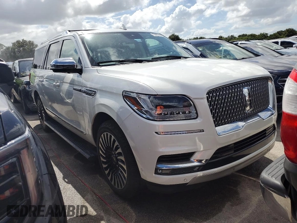 2020 Lincoln Navigator Black Label z VIN 5LMJJ3TT4LEL21595, wystawiony jako Copart lot #73951494 z przebiegiem Nie podano mil oraz Szkoda całkowita • Salvage title. Historia ofert i sprzedaży dostępna na DreamBid. Obrazek 4.