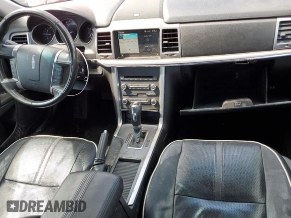 2011 Lincoln MKZ с VIN 3LNHL2GC6BR775827, выставлен на аукционе Copart как лот 55346005 с пробегом 145 373 миль миль и Списание • Salvage title. История ставок и продаж доступна на DreamBid. Изображение 8.