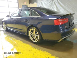 2014 Audi S6 Prestige z VIN WAUF2AFC2EN044116, wystawiony jako Copart lot #56415015 z przebiegiem 112 284 mil mil oraz Tytuł czysty. Historia ofert i sprzedaży dostępna na DreamBid. Obrazek 2.