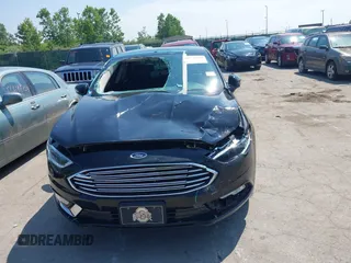 2017 Ford Fusion Titanium with VIN 3FA6P0K9XHR117300, listed as a IAAI auction lot 42731703 with 47,276 mi miles and . Bid and sale history available at DreamBid. Image 12.