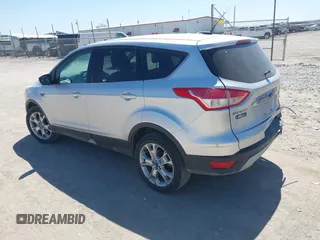 2013 Ford Escape SEL with VIN 1FMCU9H91DUA14749, listed as a IAAI auction lot 42039685 with 186,669 mi miles. Bid and sale history available at carsss.com. Image 3.