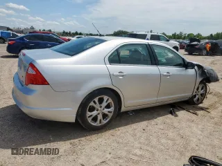 2012 Ford Fusion SE z VIN 3FAHP0HG8CR145183, wystawiony jako Copart lot #58627705 z przebiegiem 236 148 mil mil oraz Szkoda całkowita • Salvage title. Historia ofert i sprzedaży dostępna na DreamBid. Obrazek 3.