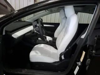 2022 Tesla Model 3 with VIN 5YJ3E1EA2NF336151, listed as a Copart auction lot 50795245 with 14,265 mi miles and Salvage Title. Bid and sale history available at carsss.com. Image 7.