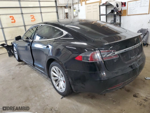 2019 Tesla Model S 100D with VIN 5YJSA1E46KF332553, listed as a Copart auction lot 41532825 with 131073 miles and Salvage Title. Bid and sale history available at carsss.com. Image 2.