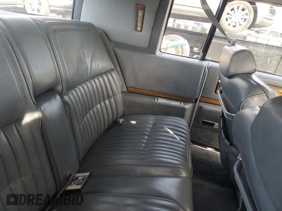 1985 Cadillac Eldorado z VIN 1G6EL5786FE628861, wystawiony jako Copart lot #76372384 z przebiegiem 15 146 mil mil oraz Szkody całkowita. Historia ofert i sprzedaży dostępna na DreamBid. Obrazek 11.