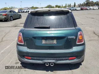2009 MINI Hardtop S with VIN WMWMF73599TT96423, listed as a Copart auction lot 63913415 with 103,165 mi miles and Clean title. Bid and sale history available at DreamBid. Image 6.