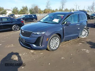 2024 Cadillac XT6 AWD Premium Luxury with VIN 1GYKPDRS2RZ737851, listed as a IAAI auction lot 41155253 with 7,988 mi miles. Bid and sale history available at carsss.com. Image 2.