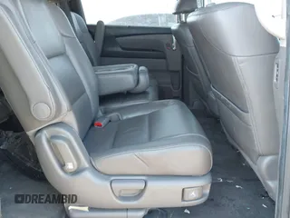 2015 Honda Odyssey EX-L z VIN 5FNRL5H64FB081051, wystawiony jako IAAI lot #42006508 z przebiegiem 154 923 mil mil oraz . Historia ofert i sprzedaży dostępna na DreamBid. Obrazek 8.