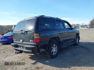 2005 GMC Yukon Denali z VIN 1GKEK63U55J254214, wystawiony jako IAAI lot #42103378 z przebiegiem 131 183 mil mil oraz . Historia ofert i sprzedaży dostępna na DreamBid. Obrazek 6.