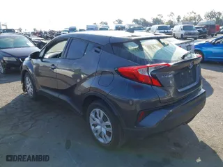2021 Toyota C-HR LE with VIN JTNKHMBX6M1098630, listed as a IAAI auction lot 41451015 with 67,426 mi miles. Bid and sale history available at carsss.com. Image 3.