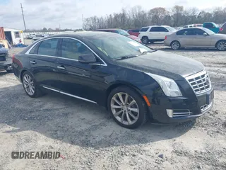 2013 Cadillac XTS Premium with VIN 2G61S5S30D9211085, listed as a IAAI auction lot 41775693 with 174,933 mi miles. Bid and sale history available at carsss.com. Image 1.