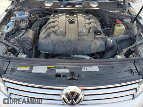 2016 Volkswagen Touareg Sport z VIN WVGEP9BPXGD005351, wystawiony jako Copart lot #60719065 z przebiegiem 133 674 mil mil oraz Czysty tytuł • Clean title. Historia ofert i sprzedaży dostępna na DreamBid. Obrazek 12.