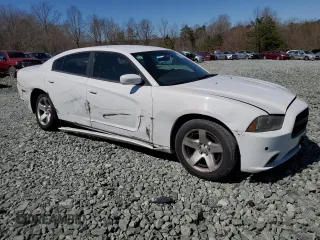 2014 Dodge Charger Police with VIN 2C3CDXAT1EH146630, listed as a Copart auction lot 49868615 with 119,327 mi miles and Salvage Title. Bid and sale history available at carsss.com. Image 4.