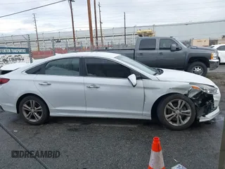 2018 Hyundai Sonata Sport with VIN 5NPE34AF8JH651873, listed as a IAAI auction lot 41777464 with 97,342 mi miles and . Bid and sale history available at carsss.com. Image 13.