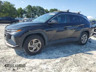 2023 Hyundai Tucson SEL with VIN 5NMJBCAE9PH227465, listed as a Copart auction lot 62201775 with 63,679 mi miles and Salvage title. Bid and sale history available at DreamBid. Image 1.