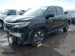 2017 Honda Ridgeline RTL-E with VIN 5FPYK3F7XHB030565, listed as a IAAI auction lot 41795386 with 79,252 mi miles. Bid and sale history available at carsss.com. Image 2.