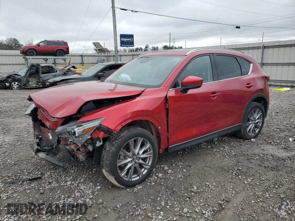 2021 Mazda CX-5 Grand Touring Reserve with VIN JM3KFBAY5M0313517, listed as a Copart auction lot 42815805 with 34,028 mi miles and Salvage Title. Bid and sale history available at carsss.com. Image 1.