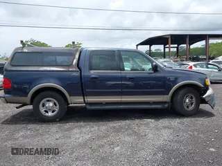 2001 Ford F-150 XLT z VIN 1FTRW07L21KC31753, wystawiony jako IAAI lot #42258913 z przebiegiem 205 960 mil mil oraz . Historia ofert i sprzedaży dostępna na DreamBid. Obrazek 13.