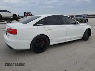 2015 Audi A6 3.0T Prestige with VIN WAUHGAFCXFN031884, listed as a Copart auction lot 41890843 with 136,077 mi miles. Bid and sale history available at carsss.com. Image 3.