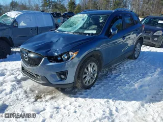 2015 Mazda CX-5 Grand Touring with VIN JM3KE4DY1F0541592, listed as a IAAI auction lot 41585018 with 113,016 mi miles. Bid and sale history available at carsss.com. Image 18.