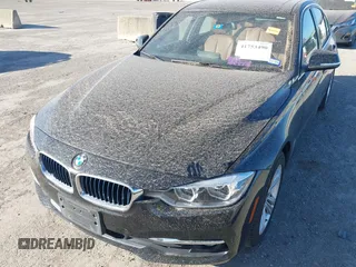 2017 BMW 3 Series 330e iPerformance with VIN WBA8E1C34HA156688, listed as a IAAI auction lot 41753490 with 74,130 mi miles. Bid and sale history available at carsss.com. Image 6.