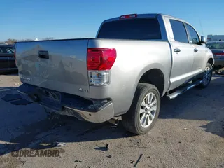 2012 Toyota Tundra 4WD Truck LTD with VIN 5TFHW5F18CX251584, listed as a IAAI auction lot 41054238 with 124,892 mi miles. Bid and sale history available at carsss.com. Image 4.
