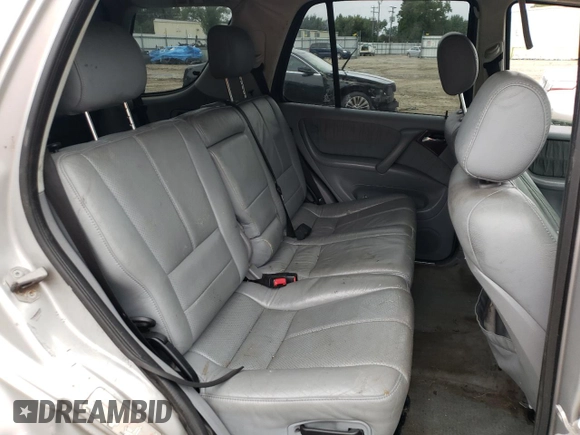 2000 Mercedes-Benz M-Class with VIN 4JGAB54E5YA202352, listed as a Copart auction lot 73734624 with 295,895 mi miles and Salvage Title. Bid and sale history available at carsss.com. Image 12.