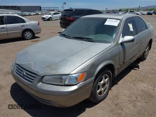 1998 Toyota Camry LE z VIN JT2BG22K8W0113985, wystawiony jako IAAI lot #42321418 z przebiegiem 277 270 mil mil oraz . Historia ofert i sprzedaży dostępna na DreamBid. Obrazek 6.