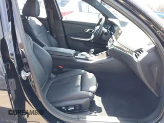 2019 BMW 3 Series 330i xDrive with VIN WBA5R7C5XKAJ78505, listed as a IAAI auction lot 41955059 with 53,216 mi miles. Bid and sale history available at carsss.com. Image 5.