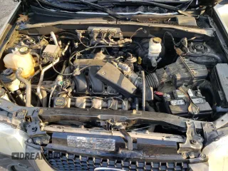 2006 Ford Escape XLT with VIN 1FMYU93176KB78724, listed as a Copart auction lot 52133775 with 160,977 mi miles and Salvage Title. Bid and sale history available at carsss.com. Image 13.