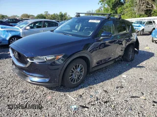 2019 Mazda CX-5 Touring with VIN JM3KFACM8K1582820, listed as a Copart auction lot 52327765 with 80,993 mi miles and Non Repairable. Bid and sale history available at carsss.com. Image 1.