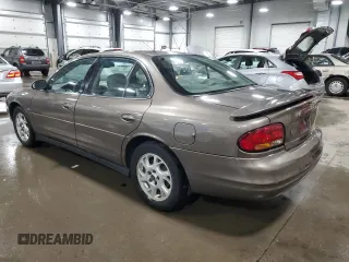 2002 Oldsmobile Intrigue GLS z VIN 1G3WX52HX2F109779, wystawiony jako Copart lot #52140934 z przebiegiem 66 159 mil mil oraz Szkody całkowita. Historia ofert i sprzedaży dostępna na DreamBid. Obrazek 2.