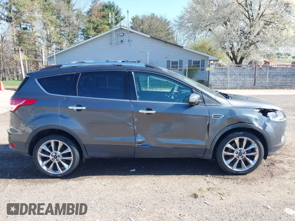 2015 Ford Escape SE with VIN 1FMCU9G97FUA89251, listed as a IAAI auction lot 41919240 with 148,472 mi miles and . Bid and sale history available at DreamBid. Image 13.