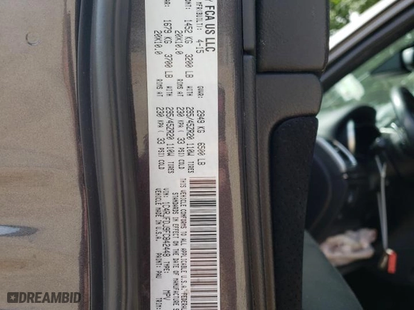 2015 Jeep Grand Cherokee SRT with VIN 1C4RJFDJ9FC842448, listed as a Copart auction lot 56956284 with 178,141 mi miles and Salvage Title. Bid and sale history available at carsss.com. Image 15.