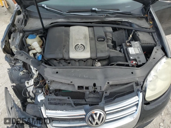 2009 Volkswagen Jetta S z VIN 3VWJM71K49M094862, wystawiony jako Copart lot #51166725 z przebiegiem 121 849 mil mil oraz Szkoda całkowita • Salvage title. Historia ofert i sprzedaży dostępna na DreamBid. Obrazek 11.