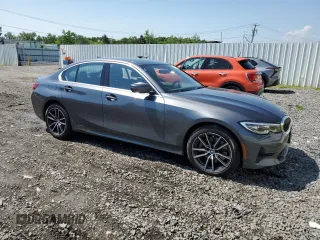 2021 BMW 3 Series 330i xDrive with VIN WBA5R7C00MFK50404, listed as a Copart auction lot 56010064 with 22,905 mi miles. Bid and sale history available at carsss.com. Image 4.