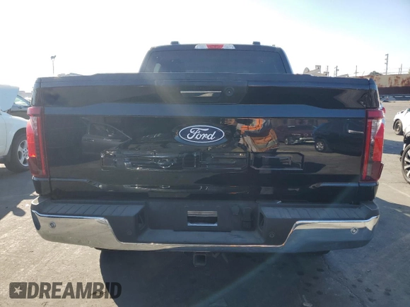 2024 Ford F-150 XLT with VIN 1FTFW3LD1RFA75938, listed as a Copart auction lot 78947444 with 14,674 mi miles and Salvage Title. Bid and sale history available at carsss.com. Image 6.