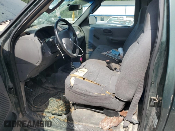 2003 Ford F-150 XL with VIN 1FTRF07223KB96495, listed as a Copart auction lot 63028535 with 217,315 mi miles and Clean title. Bid and sale history available at DreamBid. Image 7.