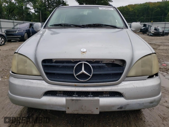 2000 Mercedes-Benz M-Class with VIN 4JGAB54E5YA202352, listed as a Copart auction lot 73734624 with 295,895 mi miles and Salvage Title. Bid and sale history available at carsss.com. Image 5.
