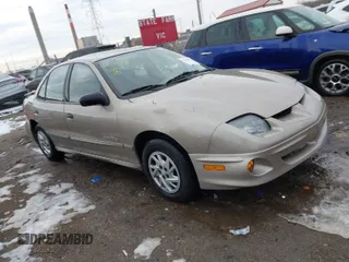 2002 Pontiac Sunfire SE z VIN 1G2JB524927104822, wystawiony jako IAAI lot #41642973 z przebiegiem 120 321 mil mil oraz . Historia ofert i sprzedaży dostępna na DreamBid. Obrazek 1.