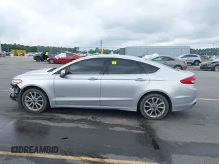 2017 Ford Fusion Hybrid SE with VIN 3FA6P0LU2HR317784, listed as a IAAI auction lot 42618554 with 114,814 mi miles and . Bid and sale history available at DreamBid. Image 15.