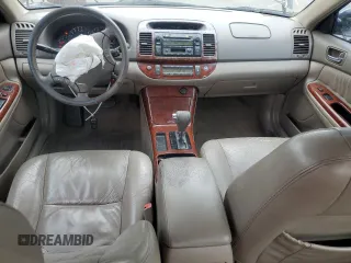 2005 Toyota Camry LE with VIN 4T1BF32K45U102615, listed as a Copart auction lot 56182705 with 196,300 mi miles and Salvage Title. Bid and sale history available at DreamBid. Image 8.
