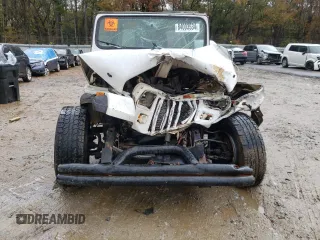 1995 Jeep Wrangler S with VIN 1J4FY19P7SP205053, listed as a Copart auction lot 84003534 with 215,769 mi miles and Salvage Title. Bid and sale history available at carsss.com. Image 5.