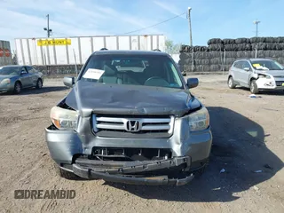 2008 Honda Pilot VP with VIN 5FNYF18208B008772, listed as a IAAI auction lot 42098599 with 186,981 mi miles and . Bid and sale history available at DreamBid. Image 6.