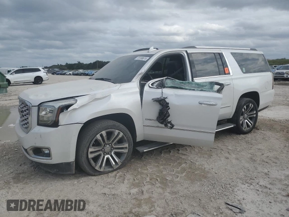 2019 GMC Yukon XL Denali with VIN 1GKS1HKJ3KR251642, listed as a Copart auction lot 76199674 with 0 mi miles and Salvage Title. Bid and sale history available at carsss.com. Image 1.
