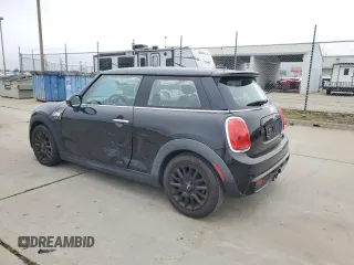 2014 MINI Hardtop S with VIN WMWXM7C57ET987069, listed as a Copart auction lot 52147955 with 121,276 mi miles and Salvage Title. Bid and sale history available at DreamBid. Image 2.