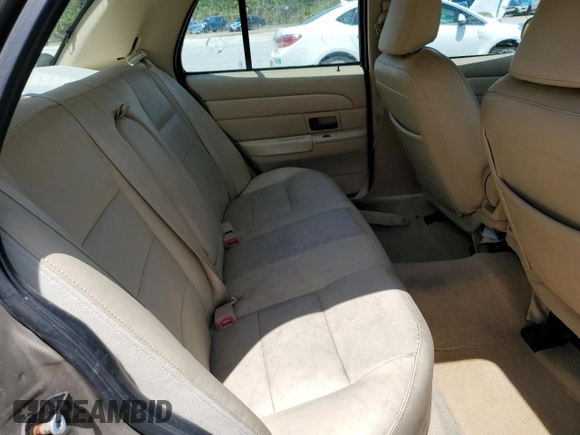 2006 Ford Crown Victoria LX z VIN 2FAFP74V56X126245, wystawiony jako Copart lot #56598055 z przebiegiem 91 400 mil mil oraz Szkody całkowita. Historia ofert i sprzedaży dostępna na DreamBid. Obrazek 10.