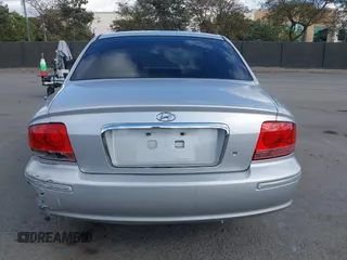 2003 Hyundai Sonata GLS with VIN KMHWF35H93A897855, listed as a IAAI auction lot 41527610 with 122,010 mi miles. Bid and sale history available at carsss.com. Image 16.