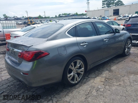 2015 Infiniti Q70 with VIN JN1BY1AP6FM540296, listed as a IAAI auction lot 42524538 with 119,933 mi miles and . Bid and sale history available at DreamBid. Image 4.