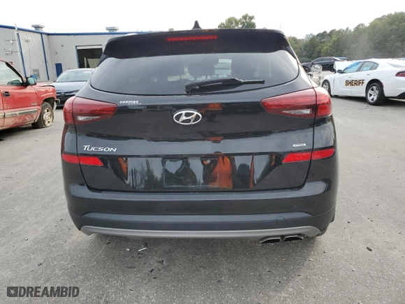 2021 Hyundai Tucson Limited with VIN KM8J3CAL0MU284746, listed as a Copart auction lot 75487414 with 33,883 mi miles and Salvage Title. Bid and sale history available at carsss.com. Image 6.